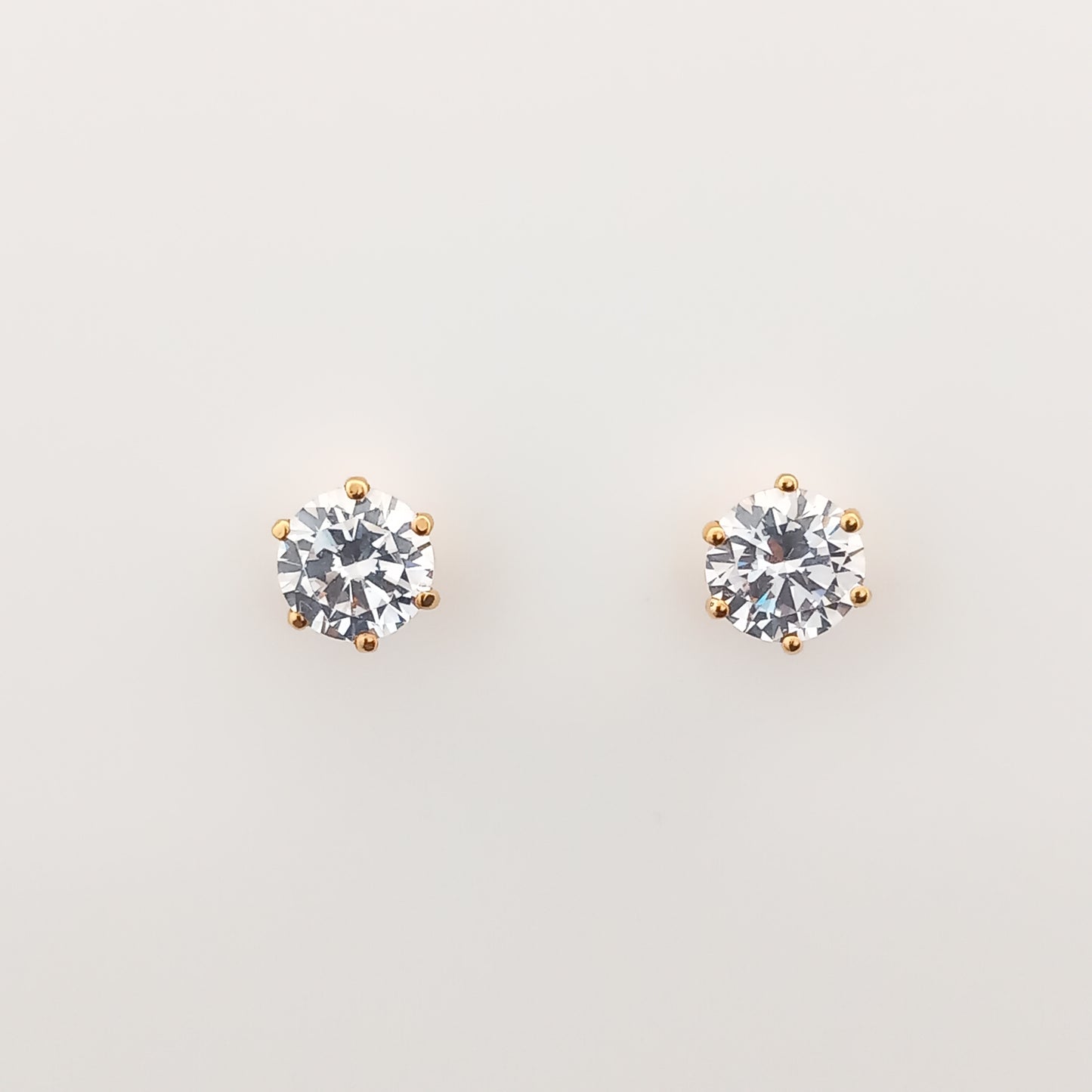 White Solitaire Gold Stud Earrings