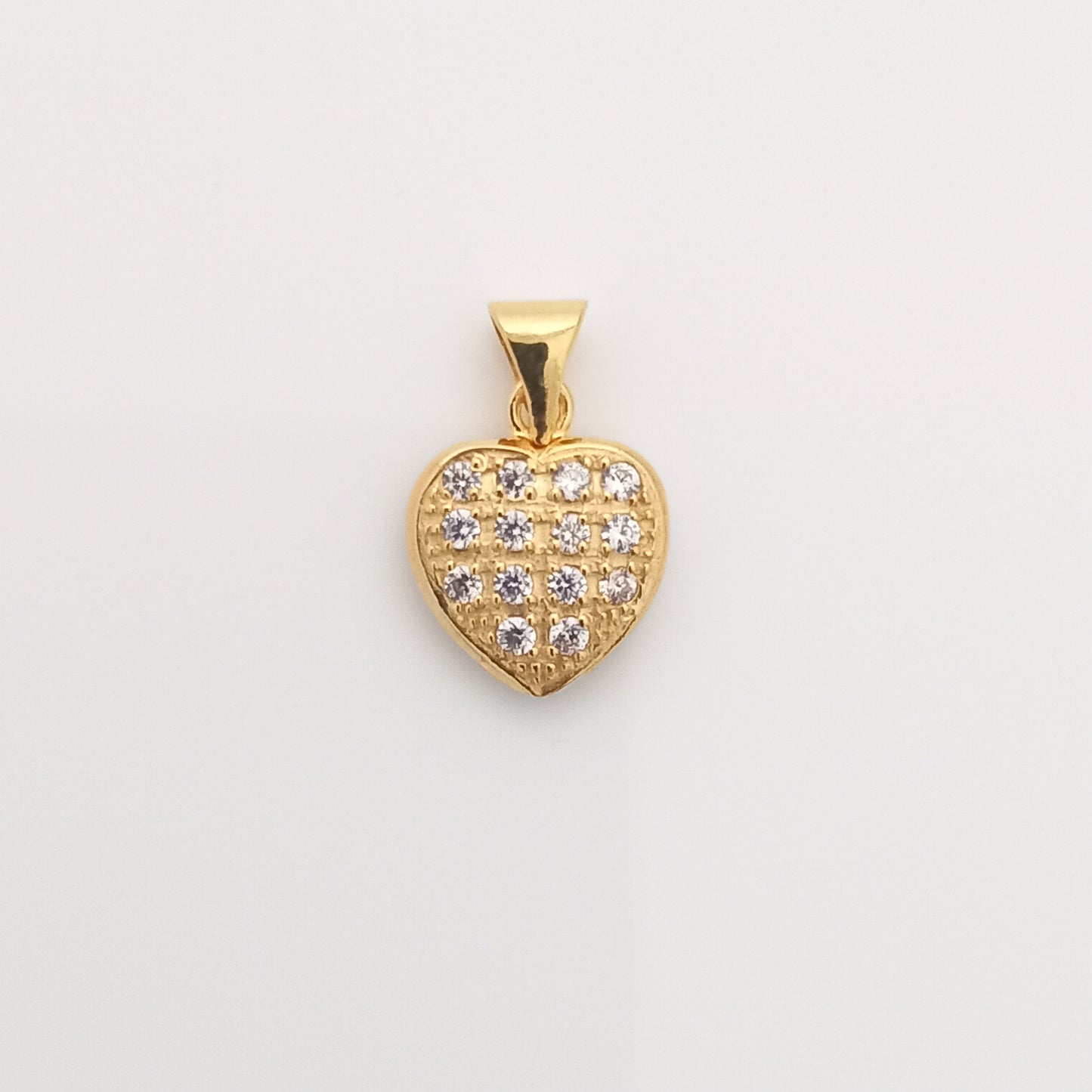 Closeup of Heart-Shaped Gold Pendant with CZ Stones