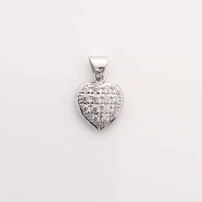 Closeup of Heart-Shaped Silver Pendant with CZ Stones