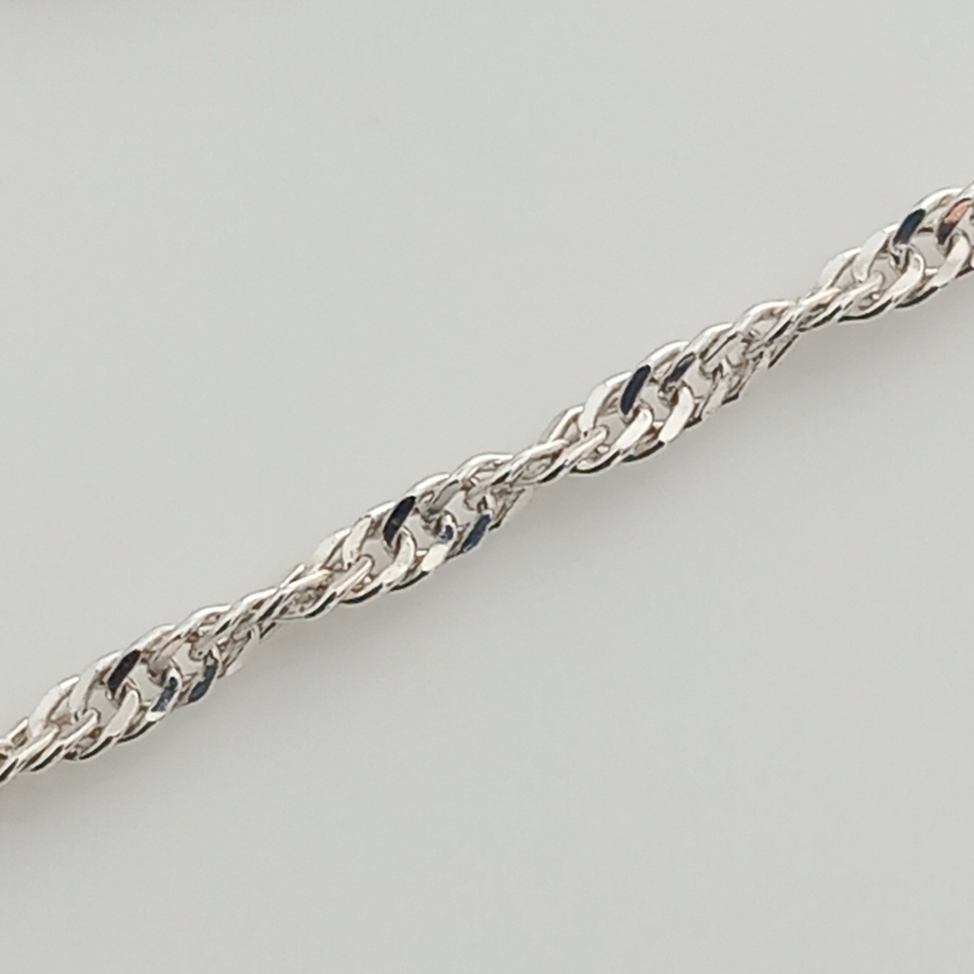 Closeup of Singapore Style Silver Chain Bracelet