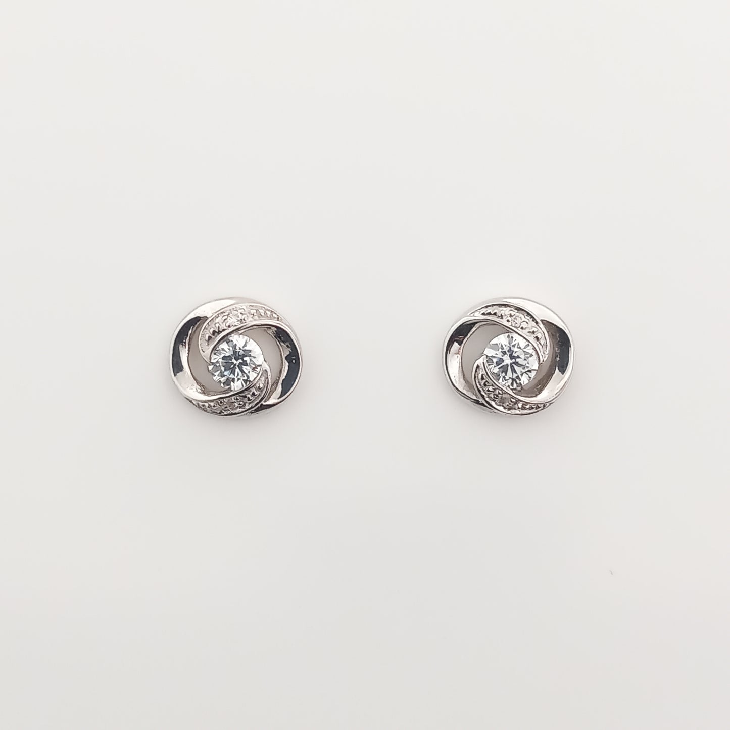 Solitaire Swirl Silver Stud Earrings