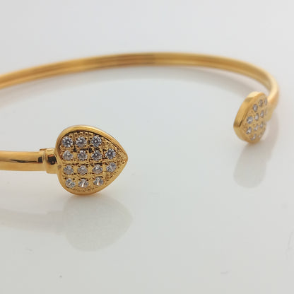 Closeup of Twin Heart Gold Open Bangle