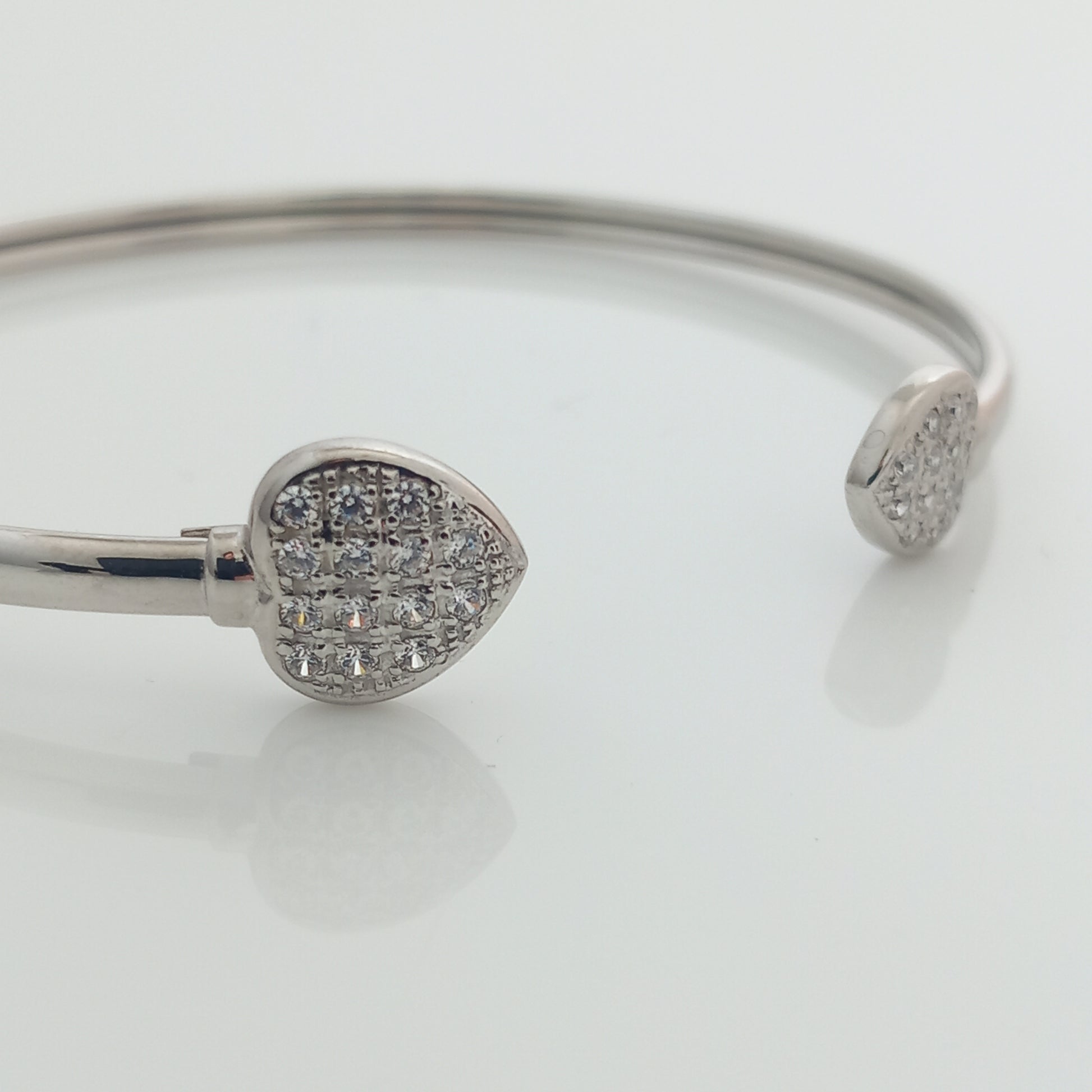 Closeup of Twin Heart Silver Open Bangle
